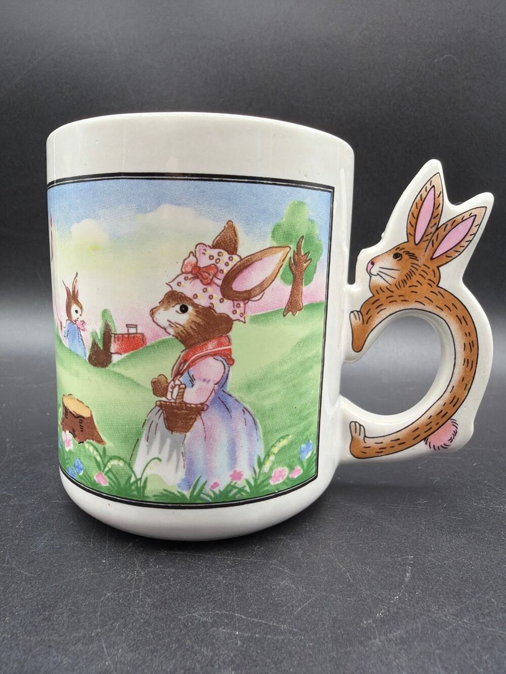 Vintage Art Mark Easter Bunny Rabbit Handle Ceramic Mug Kite Garden Scene 8 Oz